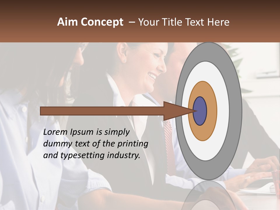 A Group Of People Sitting At A Table Working On A Computer PowerPoint Template