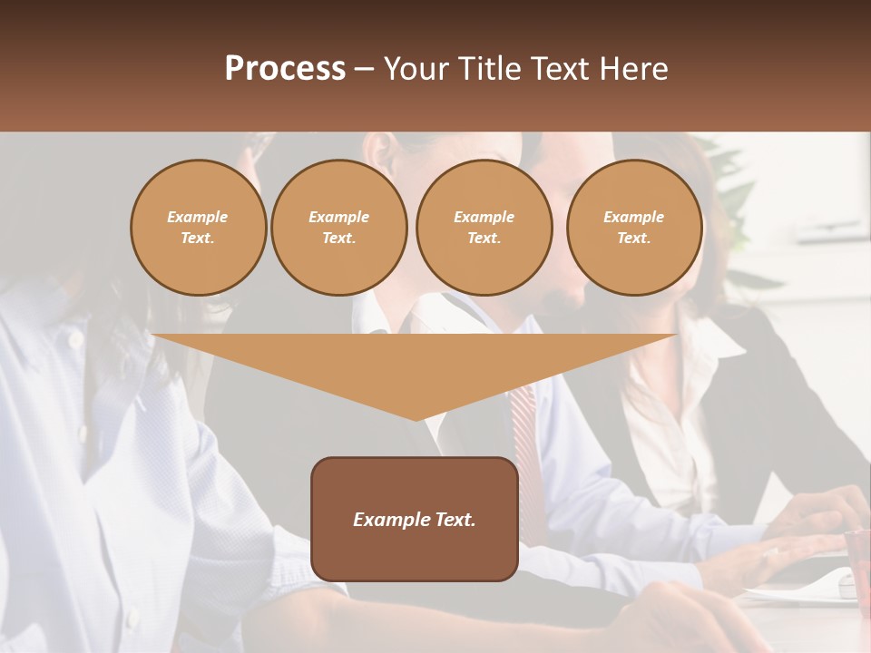A Group Of People Sitting At A Table Working On A Computer PowerPoint Template
