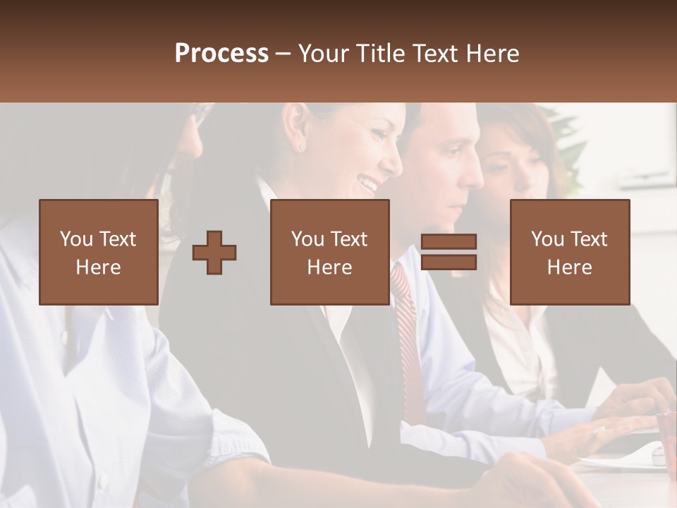 A Group Of People Sitting At A Table Working On A Computer PowerPoint Template