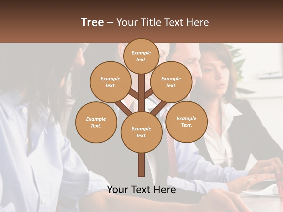 A Group Of People Sitting At A Table Working On A Computer PowerPoint Template