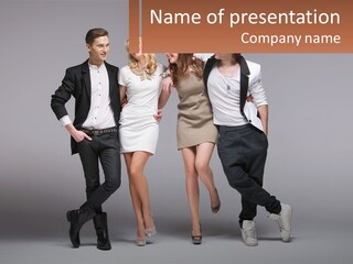 A Group Of People Standing Next To Each Other Holding A Sign PowerPoint Template