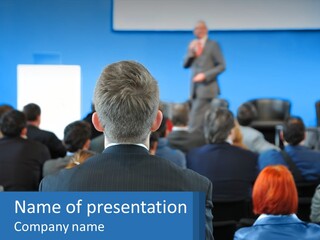 A Man Giving A Presentation To A Group Of People PowerPoint Template