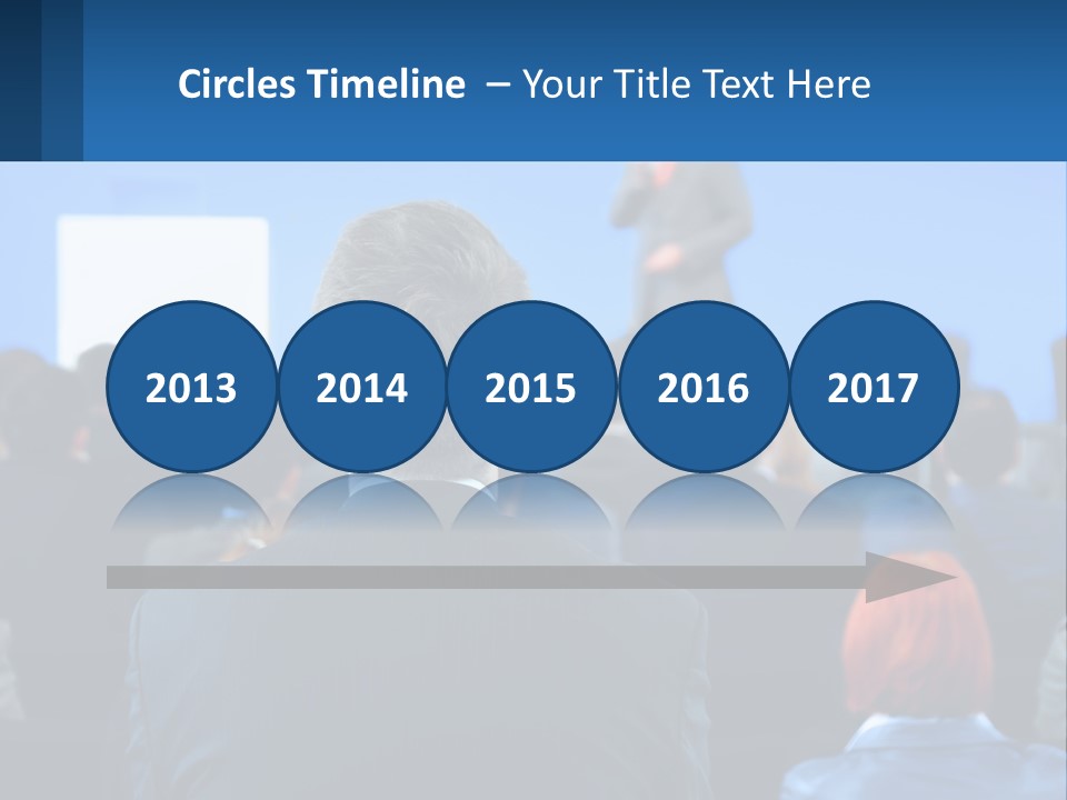 A Man Giving A Presentation To A Group Of People PowerPoint Template